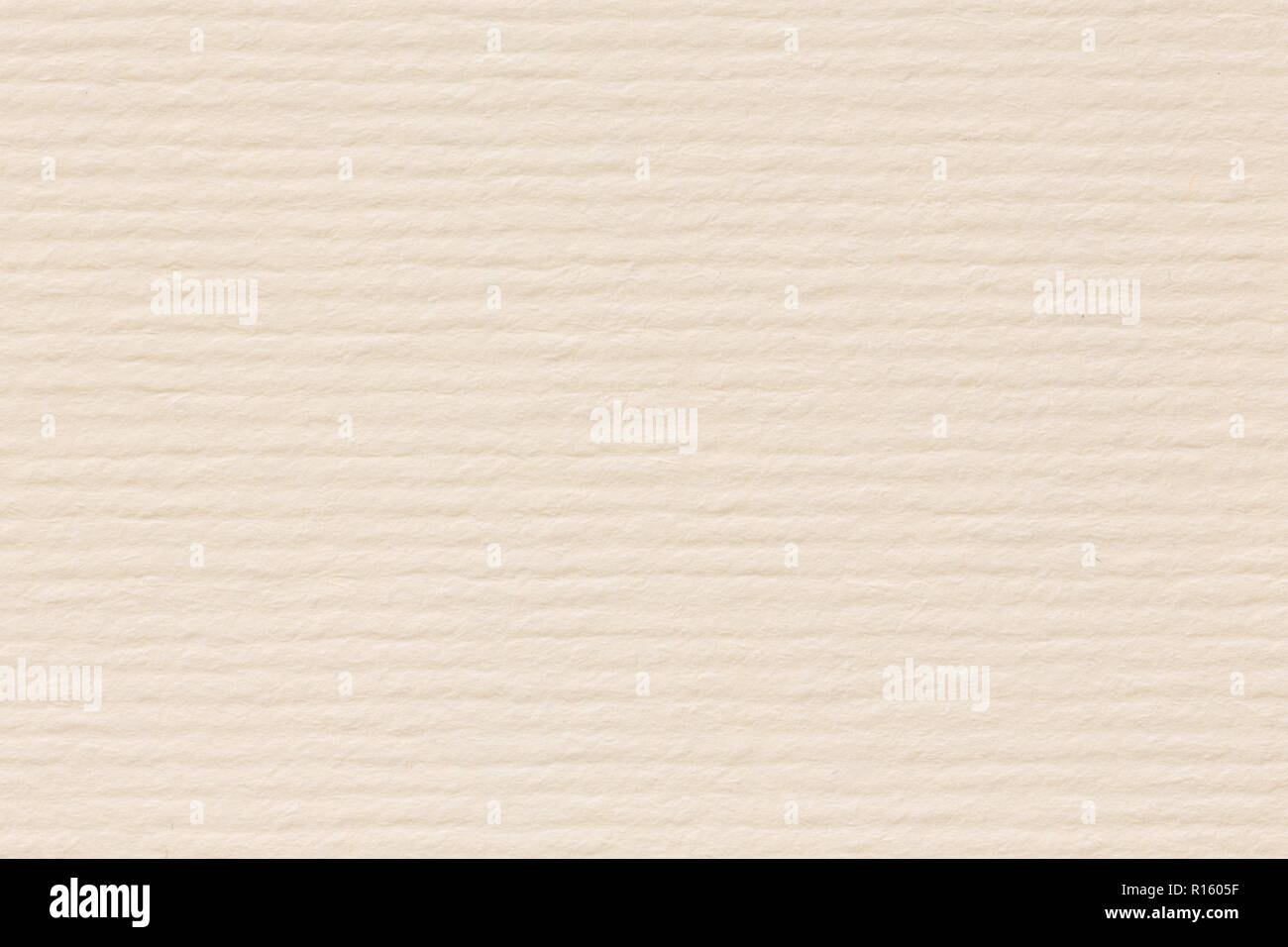 Paper texture background in light cream tone, close up Stock Photo Alamy