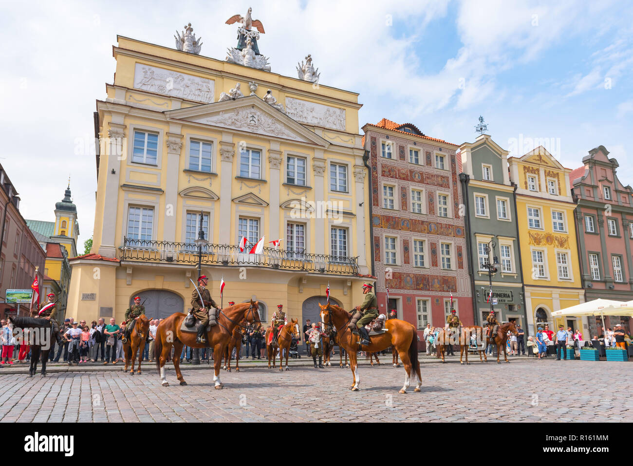 Poland Market Square, a squad of Polish Cavalry on parade in Poznan Market Square during the 3 May Constitution Day celebrations, Poland. Stock Photo