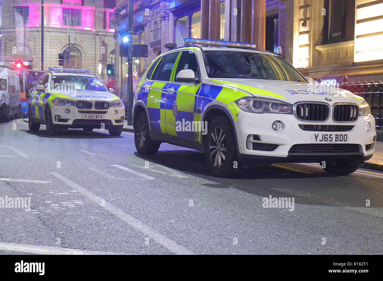 Police vehicles from West Yorkshire Police are parked near to the Leeds Lights Switch On 2018  with officers patrolling on foot to protect the city. Stock Photo