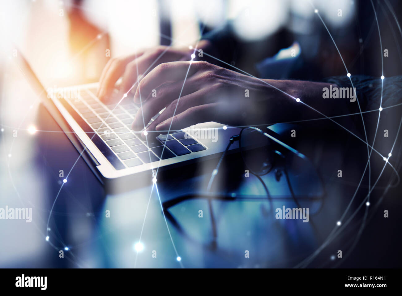 Business man works in office with laptop. Concept of internet network. double exposure Stock Photo