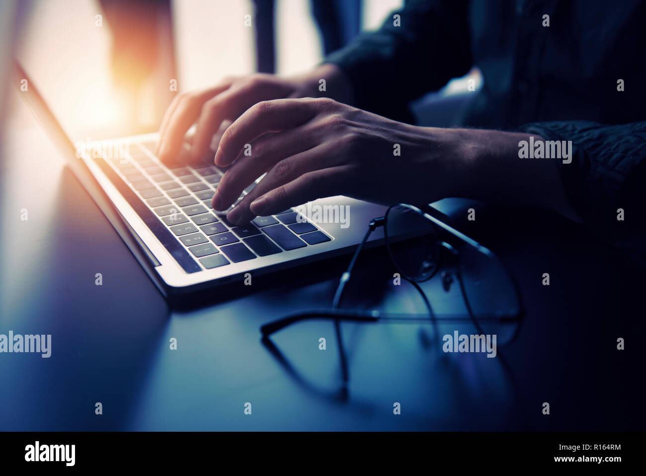 Business man works in office with laptop. Concept of internet network Stock Photo