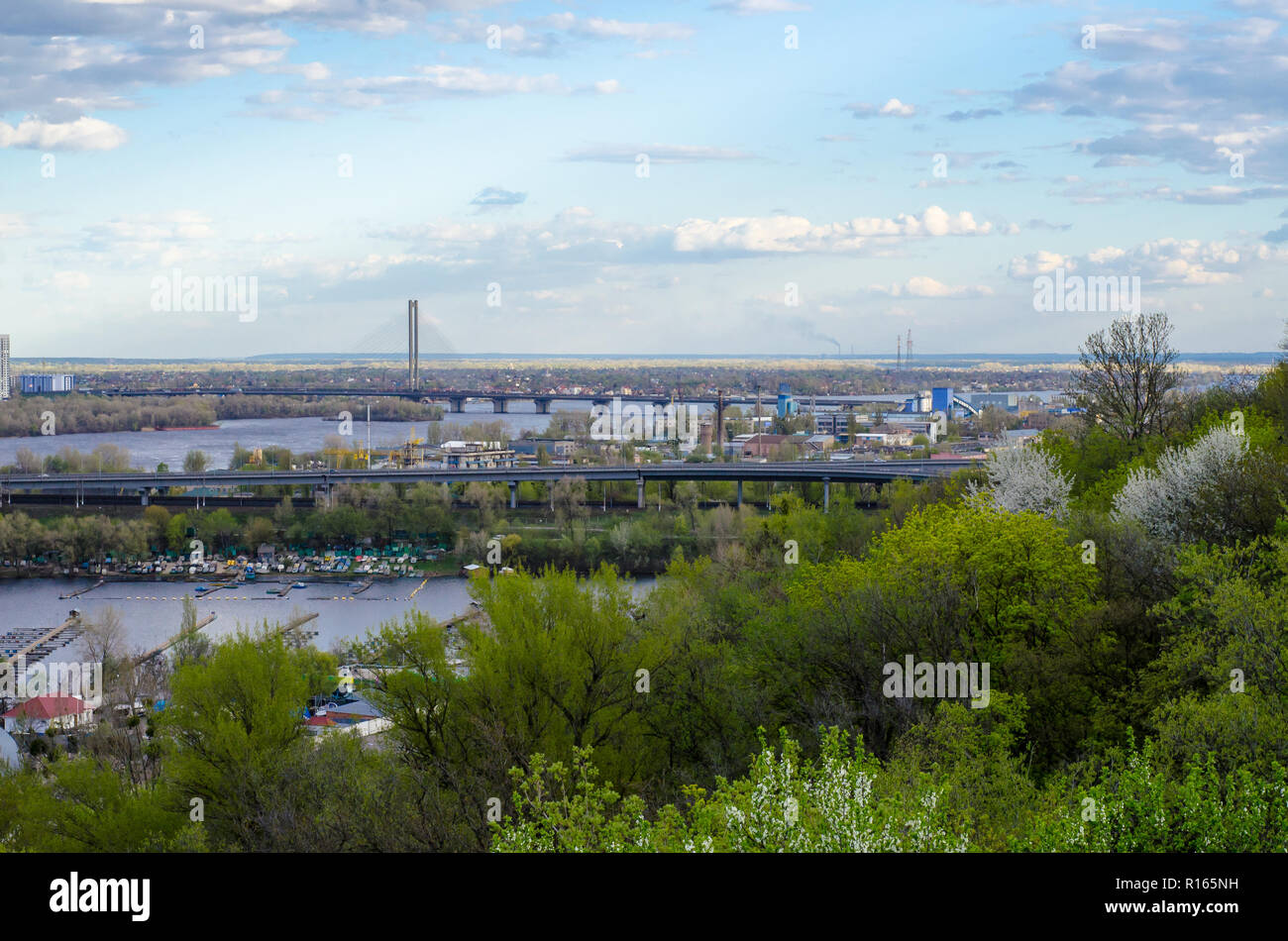 View of the city bridges across the river. Landscape of the summer city ...