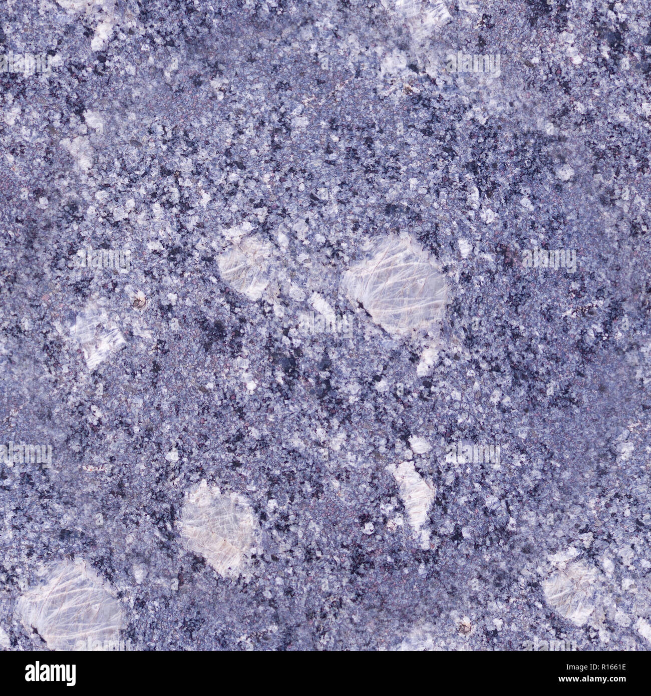 seamless grey-blue granite stone background. architecture, texture. Stock Photo