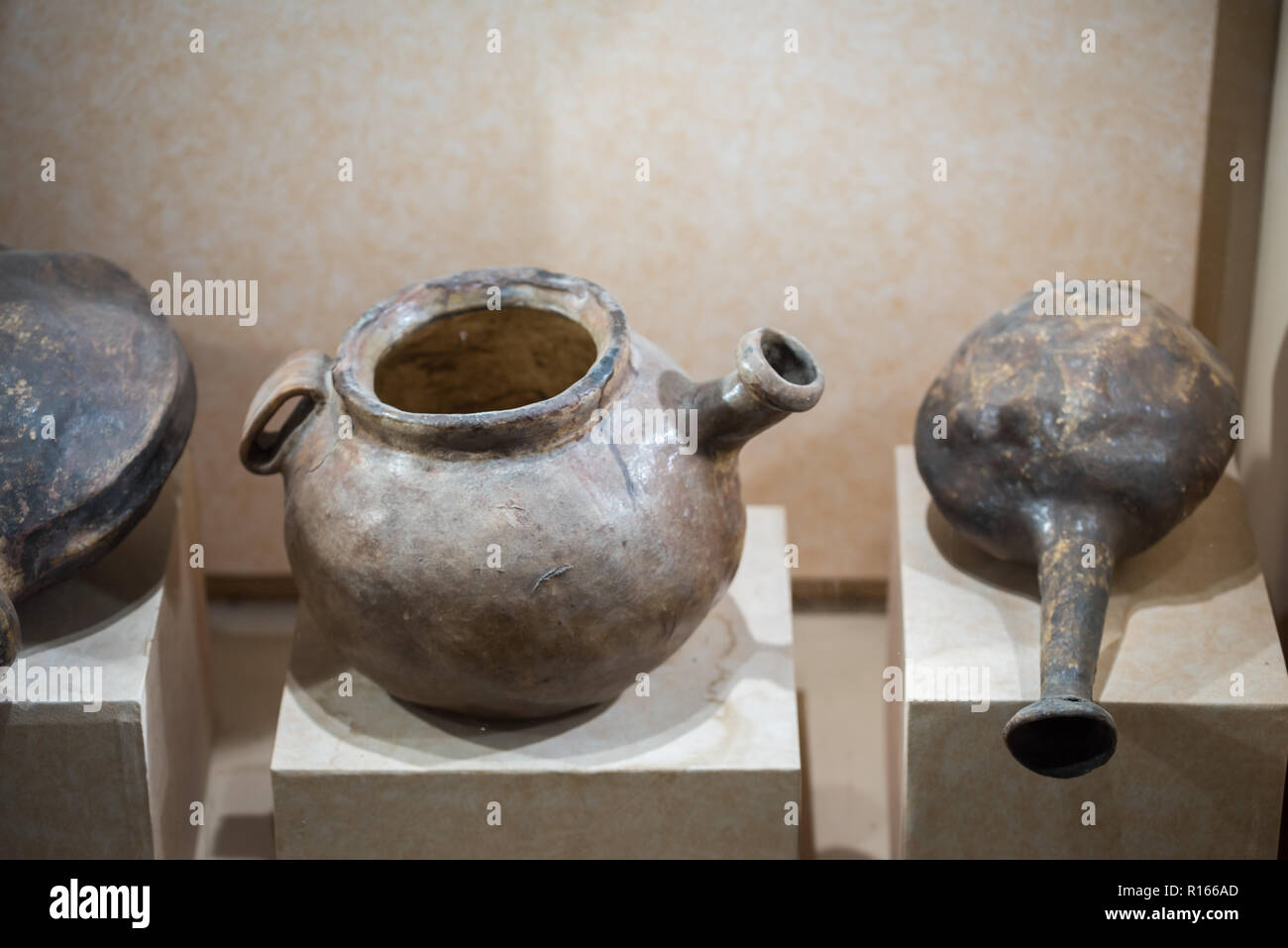 Old Vintage antique copper pots at Museum, Heritage, Abu Dhabi, UAE Stock Photo