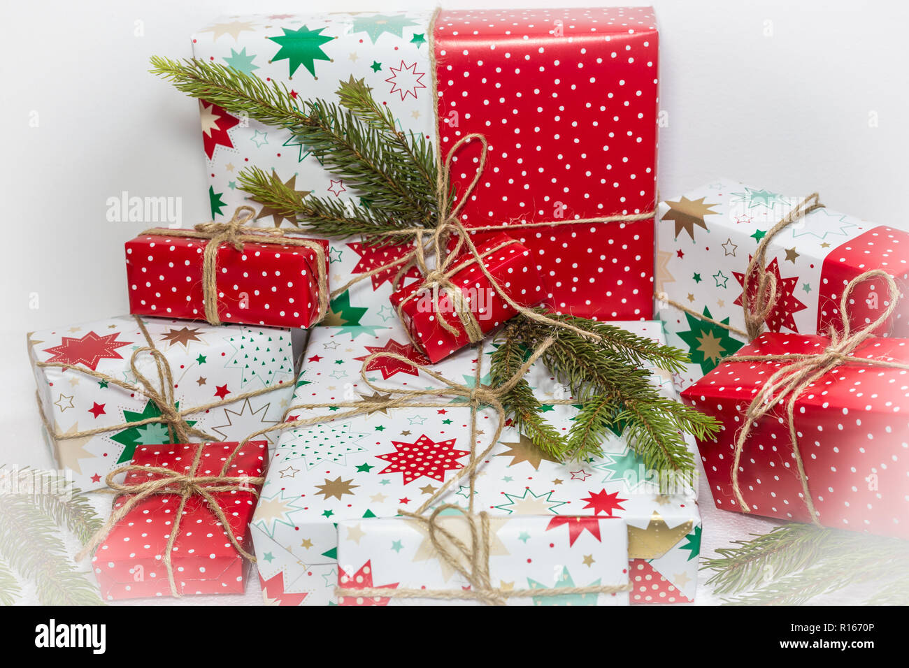 Gift boxes and fir tree isolated on white background. Christmas and New ...