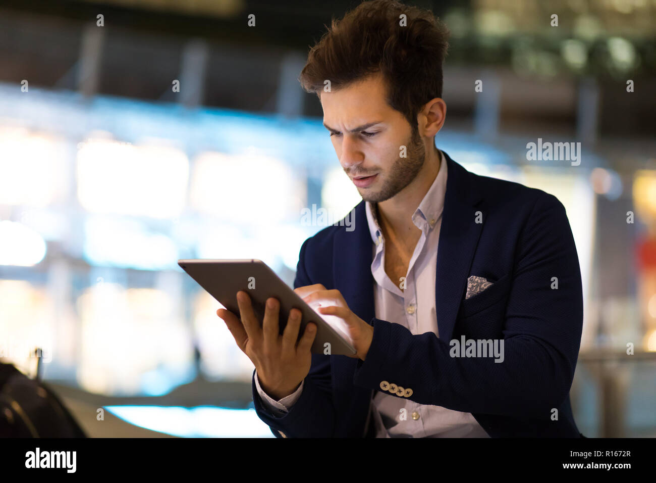 Young manager using a digital tablet outdoor Stock Photo