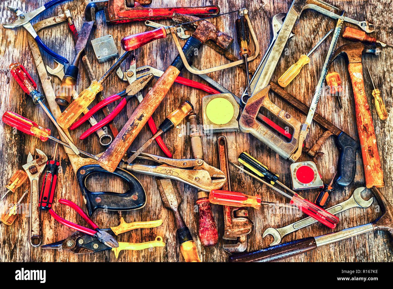 Close up of a group of tools on a wooden background. Stock Photo