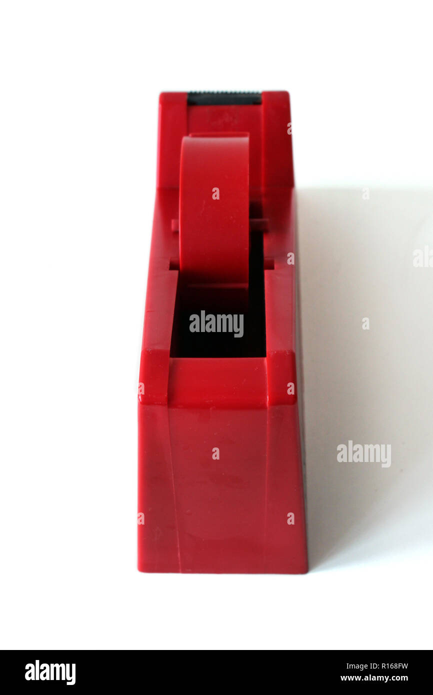 Red scotch Tape Roller dispenser isolated white background Stock Photo