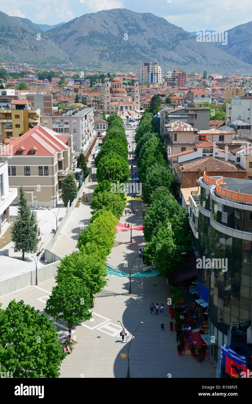 Pedestrian promenade, view from Red Tower onto Boulevard Shen Gjergji, Resurrection Cathedral at the back, city centre, Korca Stock Photo