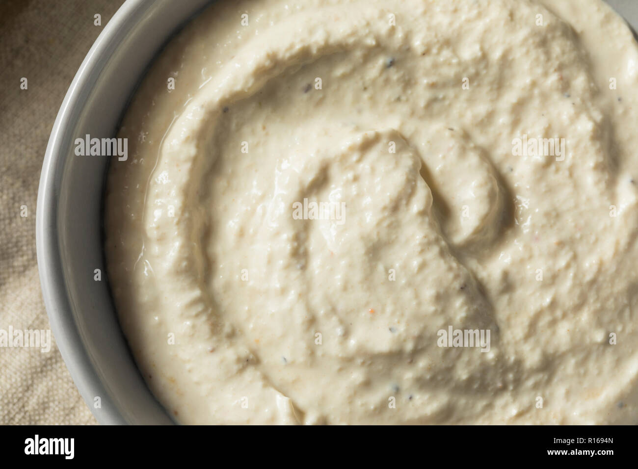 Spicy Homemade Horseradish Sauce in a Bowl Stock Photo