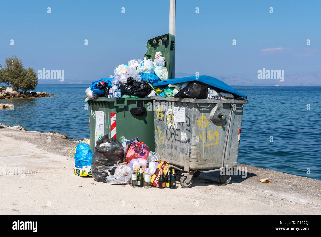 Garbage bags, garbage piles, overcrowded garbage containers, island of Corfu, Ionian Islands, Greece Stock Photo