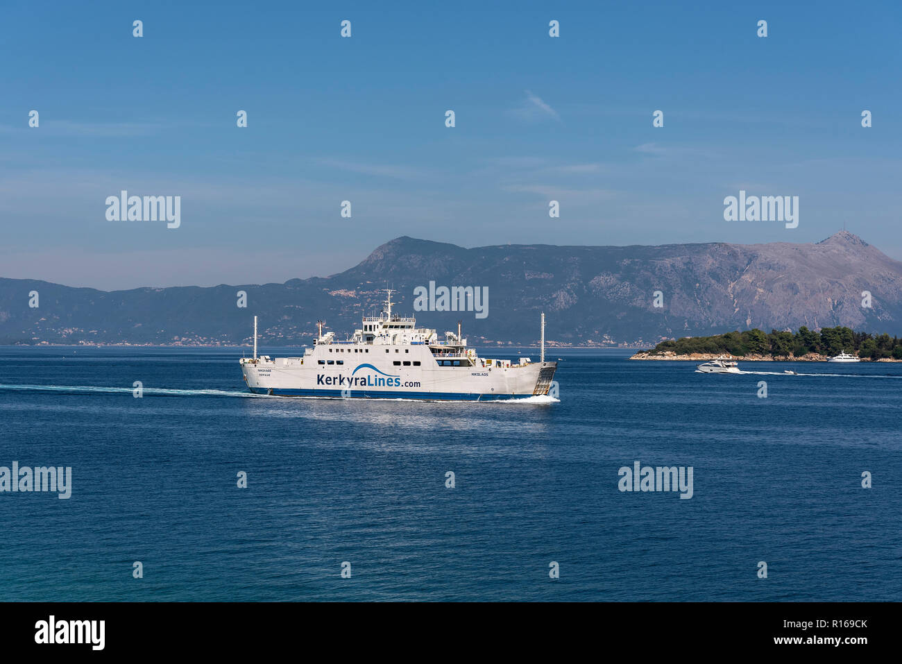 Ferry off the coast of Kerkyra, behind Albania, island of Corfu, Ionian Islands, Greece Stock Photo