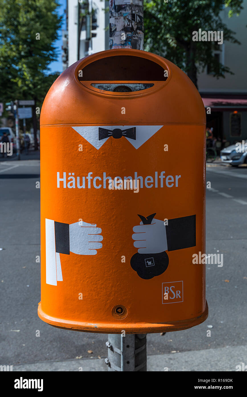 Municipal wastepaper basket with homorous slogan, Kreuzberg, Berlin, Germany Stock Photo