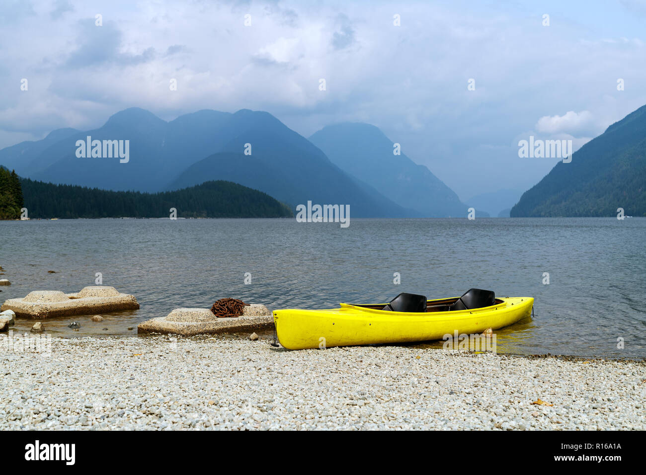 End of the summer, end of the season. Kayaks and canoes on the rack at Alouette Lake in Golden Ears Provincial Park in British Columbia, Canada Stock Photo