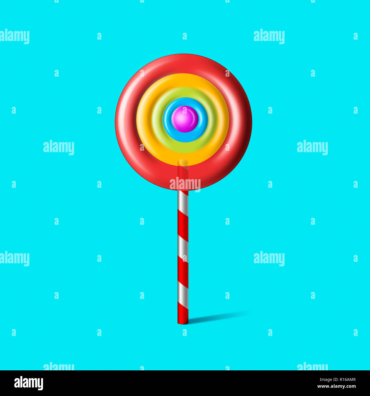 Colourful lollipop with striped lollipop stick against blue background Stock Photo
