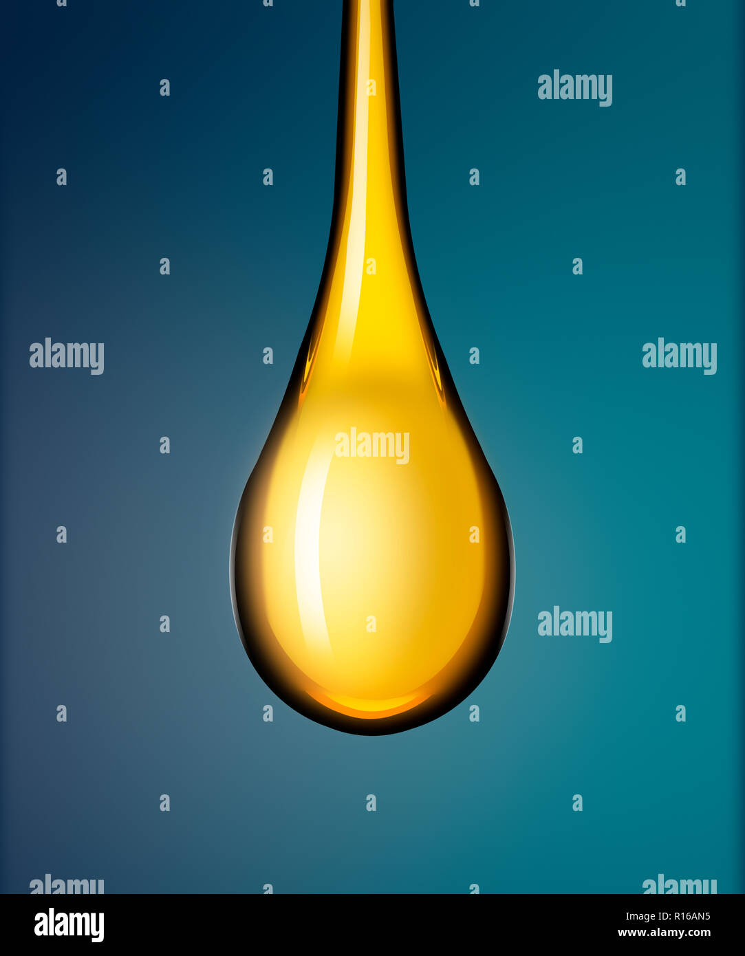 Droplet of golden liquid about to drop against blue background Stock Photo