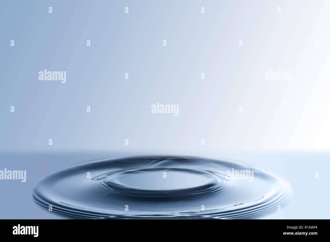 Circular ripples on liquid surface Stock Photo