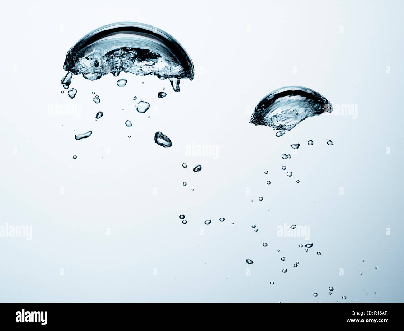 Contorting air bubbles in clear transparent liquid, detail Stock Photo