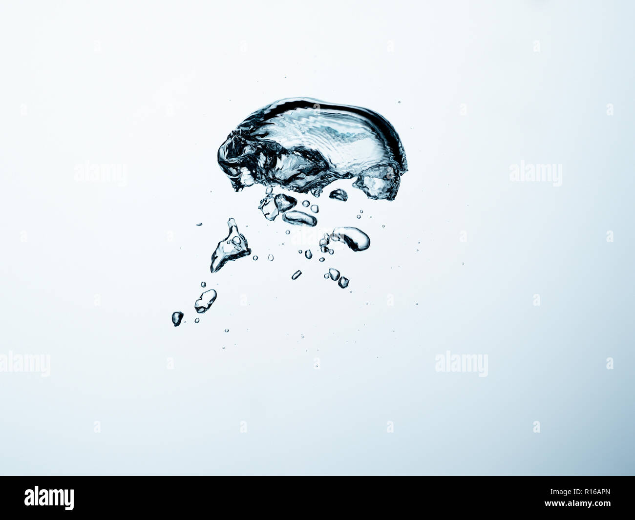 Contorting air bubbles in clear transparent liquid, detail Stock Photo