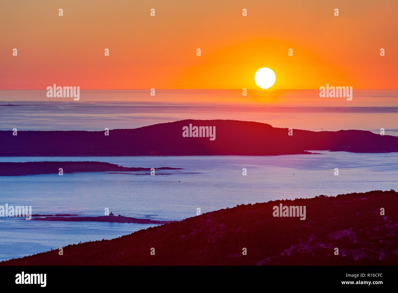 Sunrise in Acadia National Park observed from the top of Cadillac mountain. Stock Photo