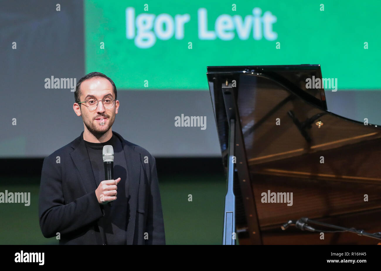 Leipzig, Germany. 09th Nov, 2018. Pianist Igor Levit speaks of Bündnis 90/Die Grünen at the federal delegates' conference before sitting down to play the piano. The party congress will focus on adopting the European election programme and drawing up the federal list of Greens for the European elections. Credit: Jan Woitas/dpa-Zentralbild/dpa/Alamy Live News Stock Photo