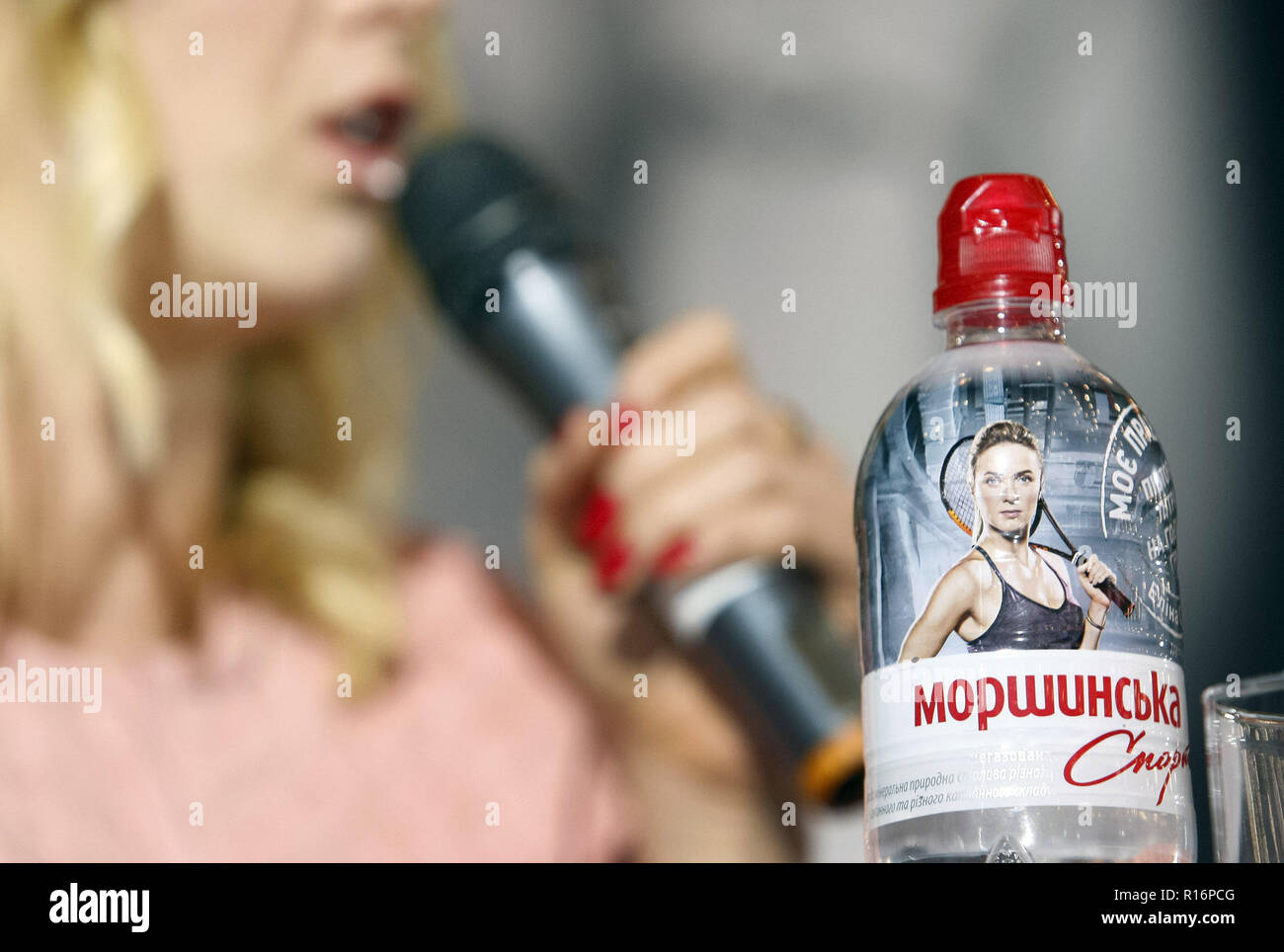 Kiev, Kiev, Ukraine. 9th Nov, 2018. A bottle of mineral water with an image of Ukrainian tennis player Elina Svitolina seen on a table during an autograph session in Kiev.Elina Svitolina of Ukraine winning against Sloane Stephens of the USA and register the biggest win of her career when she rallied for a 2-1 (3-6, 6-2, 6-2), during their singles final match of the BNP Paribas WTA Finals 2018 held in Singapore on 28 October 2018. Credit: Pavlo Gonchar/SOPA Images/ZUMA Wire/Alamy Live News Stock Photo