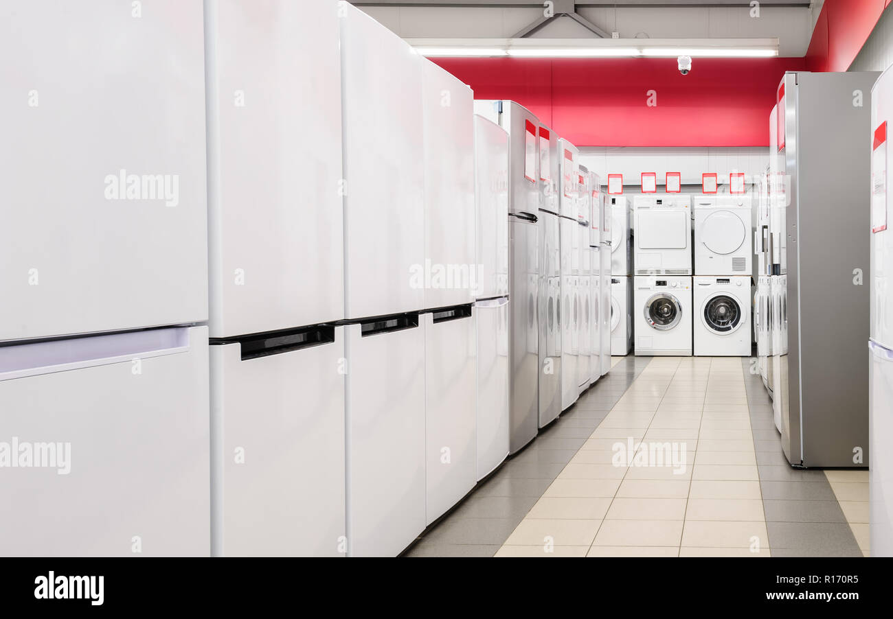 refrigerators and washing mashines in appliance store Stock Photo