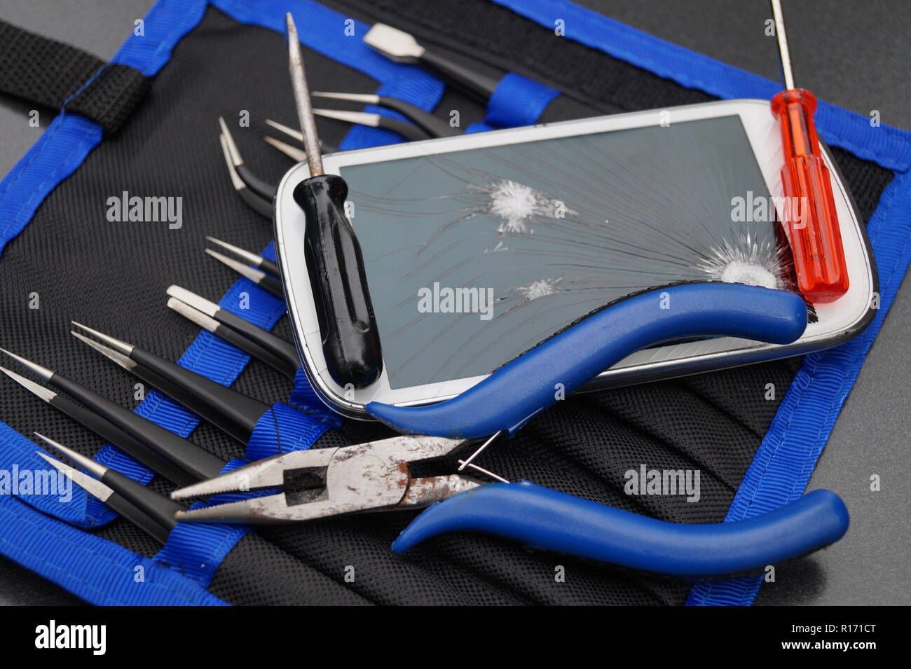 expensive Smartphone repair Stock Photo - Alamy