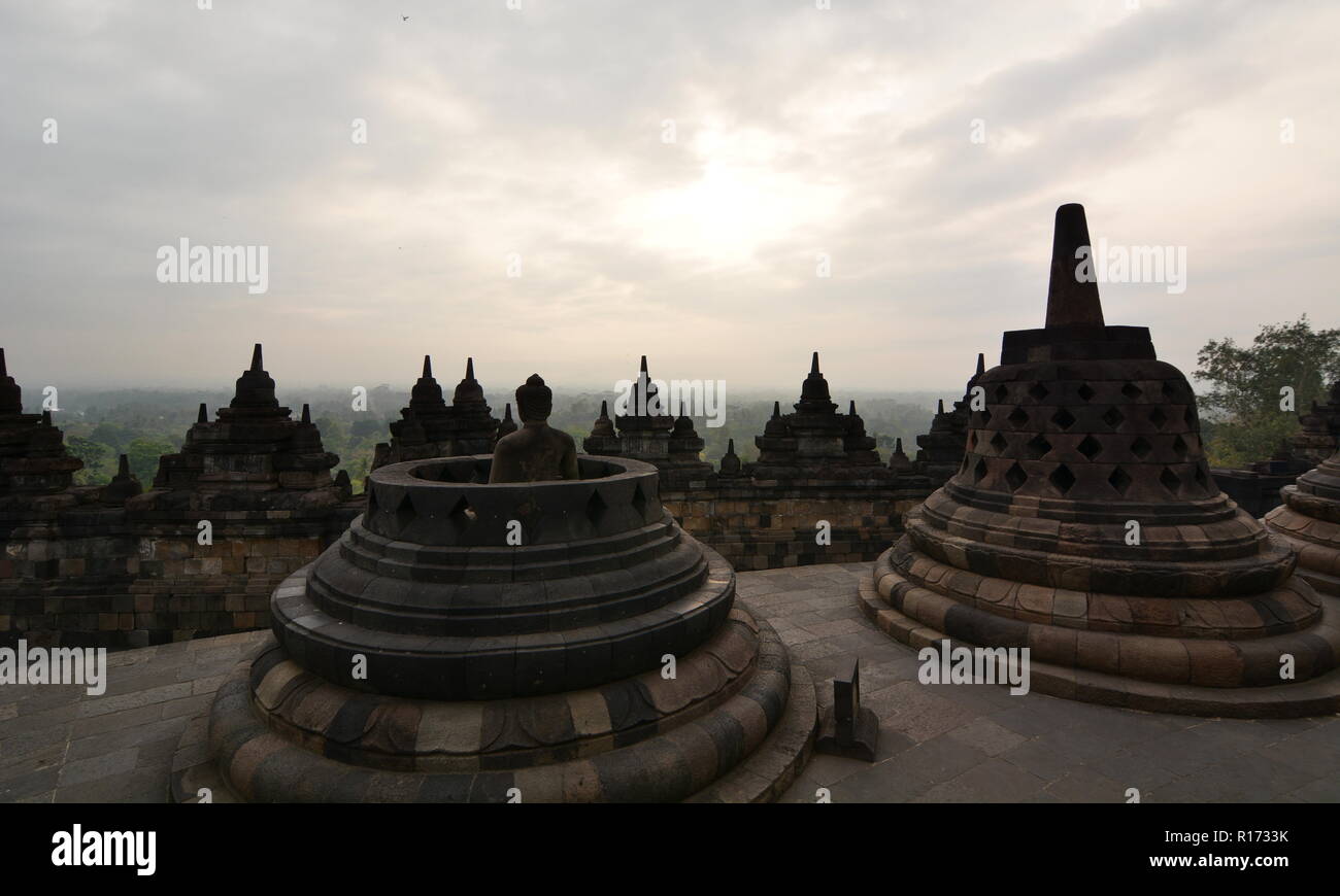 Stupas and Buddha statues. Candi Borobudur. Magelang. Central Java. Indonesia Stock Photo