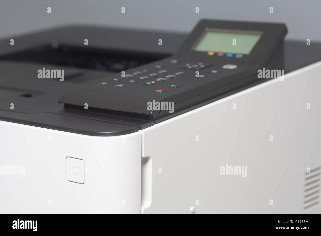 Laser color printer isolated on gray background Stock Photo