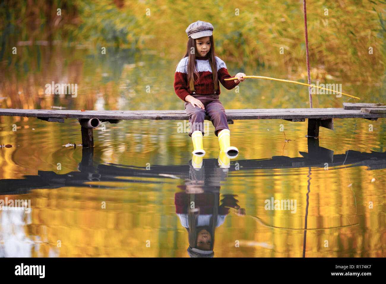 Small child fishing hi-res stock photography and images - Page 7 - Alamy