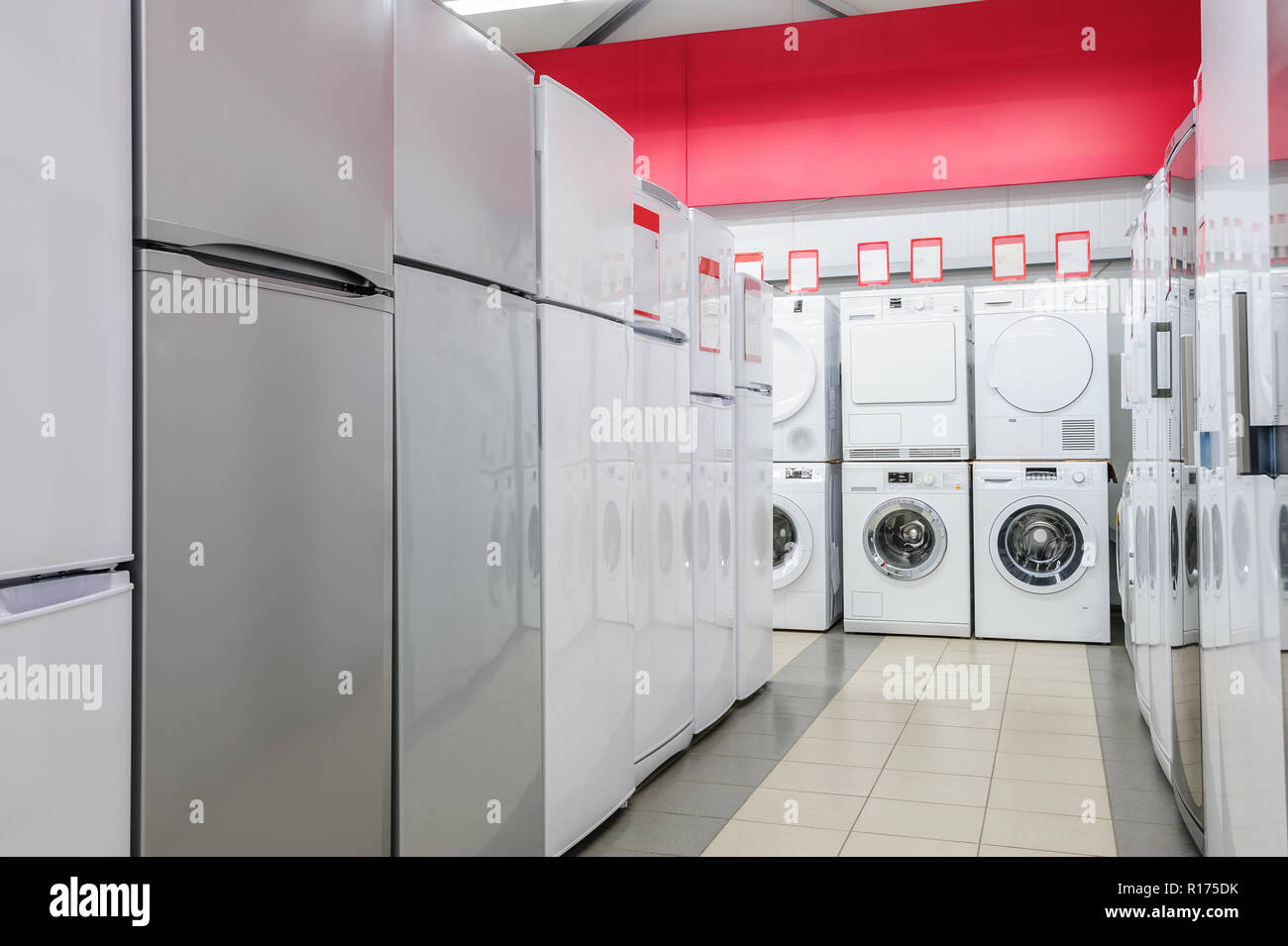 refrigerators and washing mashines in appliance store Stock Photo