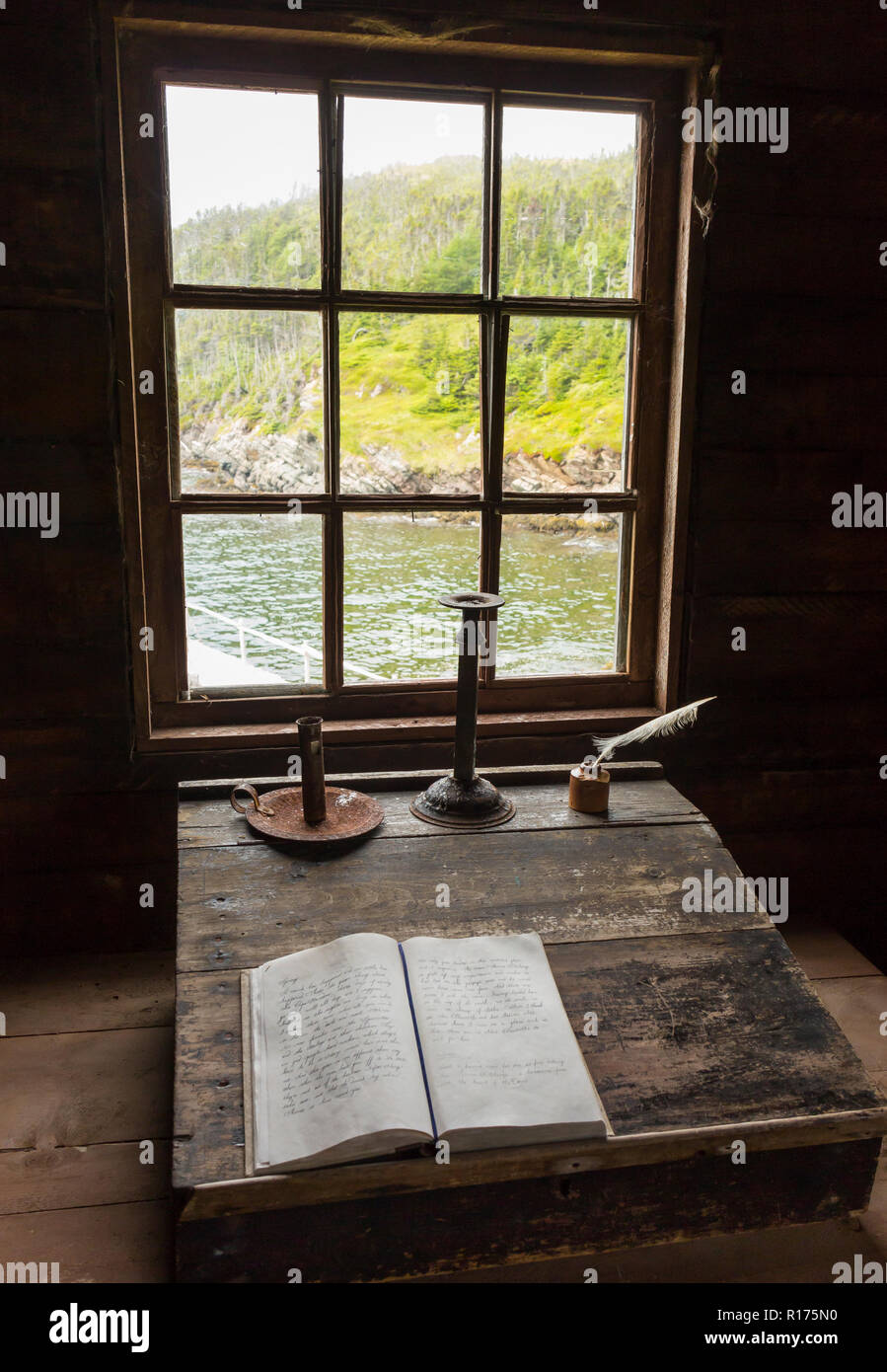 CAPE RANDOM, NEWFOUNDLAND, CANADA -Writing desk and quill, Random Passage movie set, replica of fishing village. Stock Photo