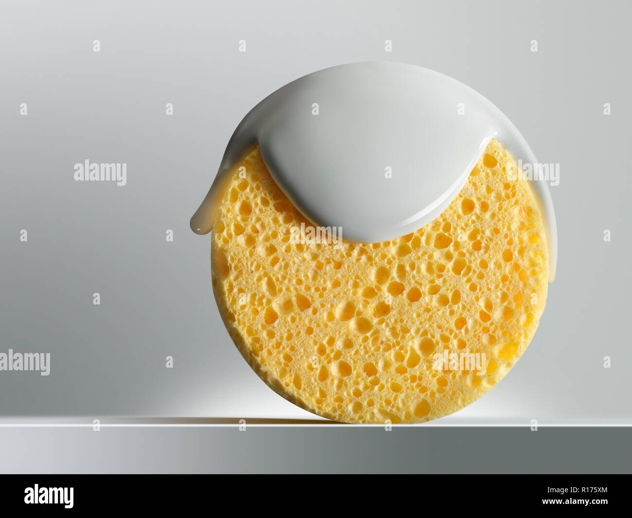 Cleansing lotion on natural sponge, white background Stock Photo