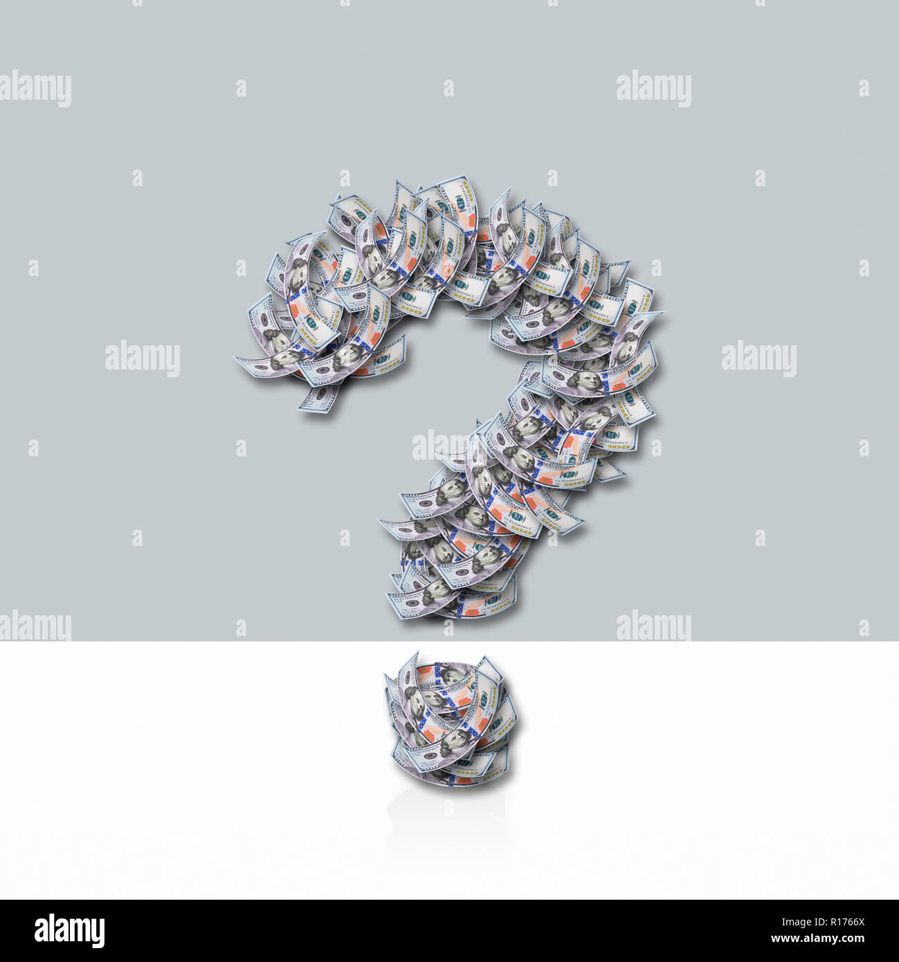 US dollar notes in shape of question mark, grey background Stock Photo