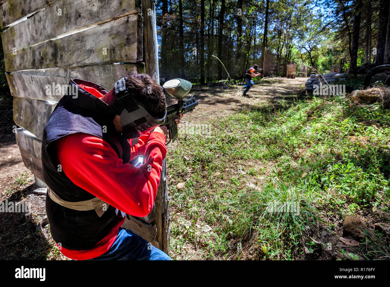 Paintball battle at the Zirahuen Forest Resort in Michoacan, Mexico. Stock Photo