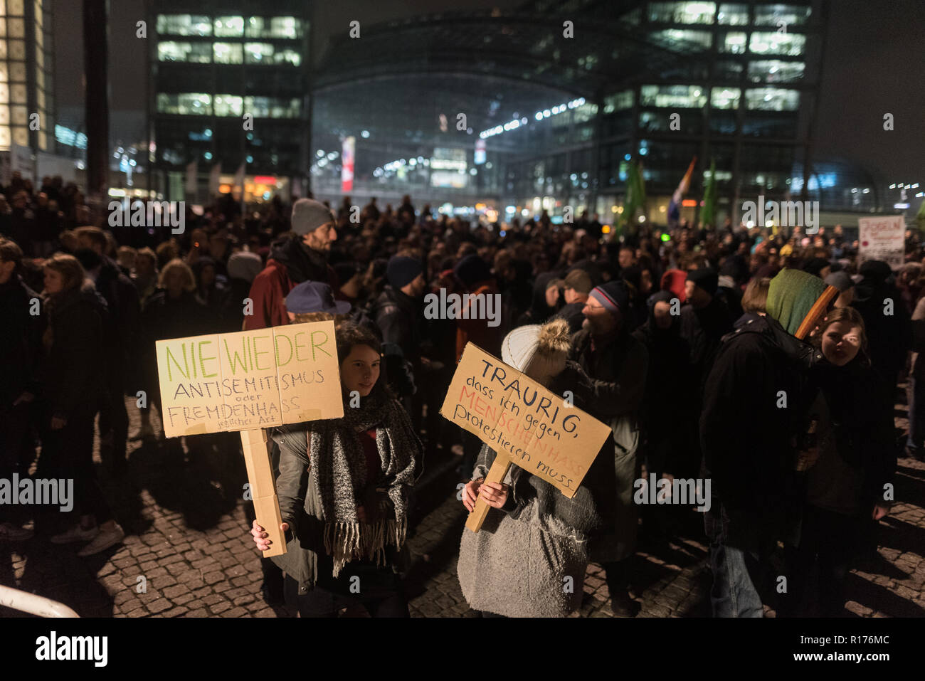 Protesters are seen holding placards during the protest. Hundreds of people have demonstrated against the funeral march of the right-wing extremist organization on the 80th anniversary of the Pogrom Night in 1938 under the motto 'Funeral March for the Dead of Politics'. Stock Photo