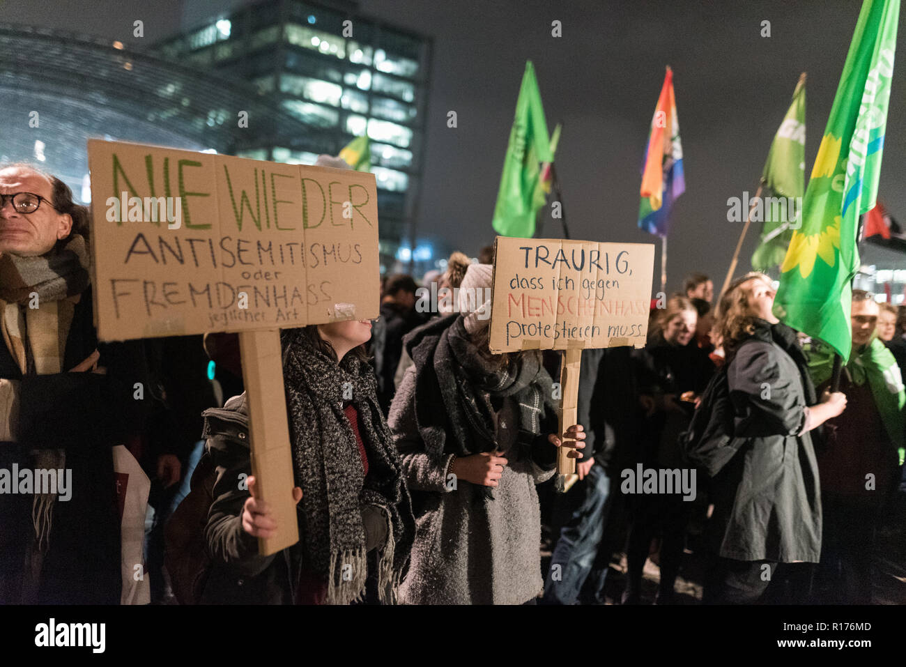 Protesters are seen holding placards during the protest. Hundreds of people have demonstrated against the funeral march of the right-wing extremist organization on the 80th anniversary of the Pogrom Night in 1938 under the motto 'Funeral March for the Dead of Politics'. Stock Photo
