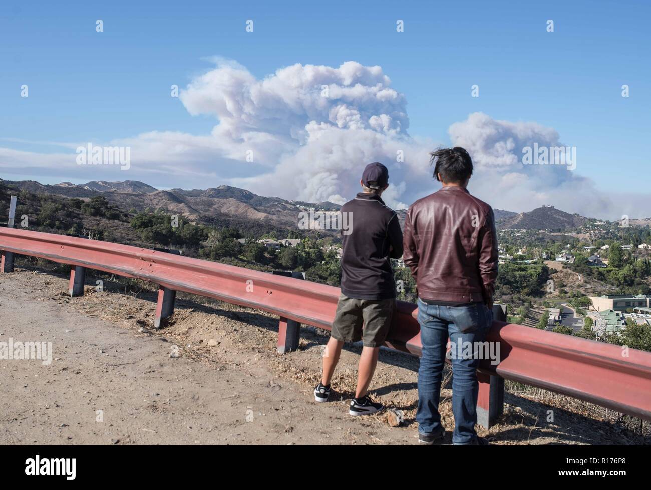 Residents of Topanga seen on standby at Topanga Canyon Road watching