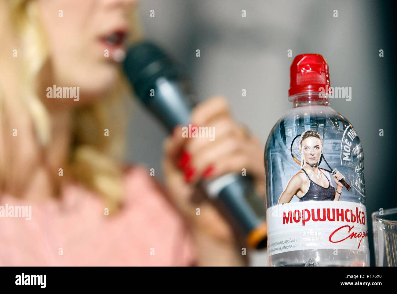 A bottle of mineral water with an image of Ukrainian tennis player Elina Svitolina seen on a table during an autograph session in Kiev. Elina Svitolina of Ukraine  winning against Sloane Stephens of the USA and register the biggest win of her career when she rallied for a 2-1 (3-6, 6-2, 6-2), during their singles final match of the BNP Paribas WTA Finals 2018 held in Singapore on 28 October 2018. Stock Photo