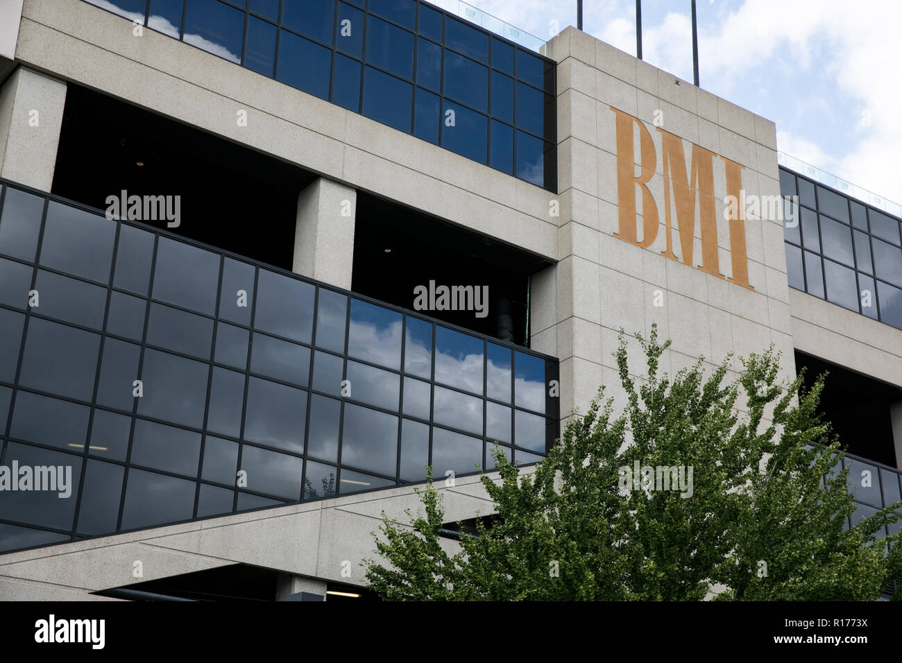 A logo sign outside of a facility occupied by Broadcast Music, Inc. (BMI) in Nashville, Tennessee, on October 9, 2018. Stock Photo