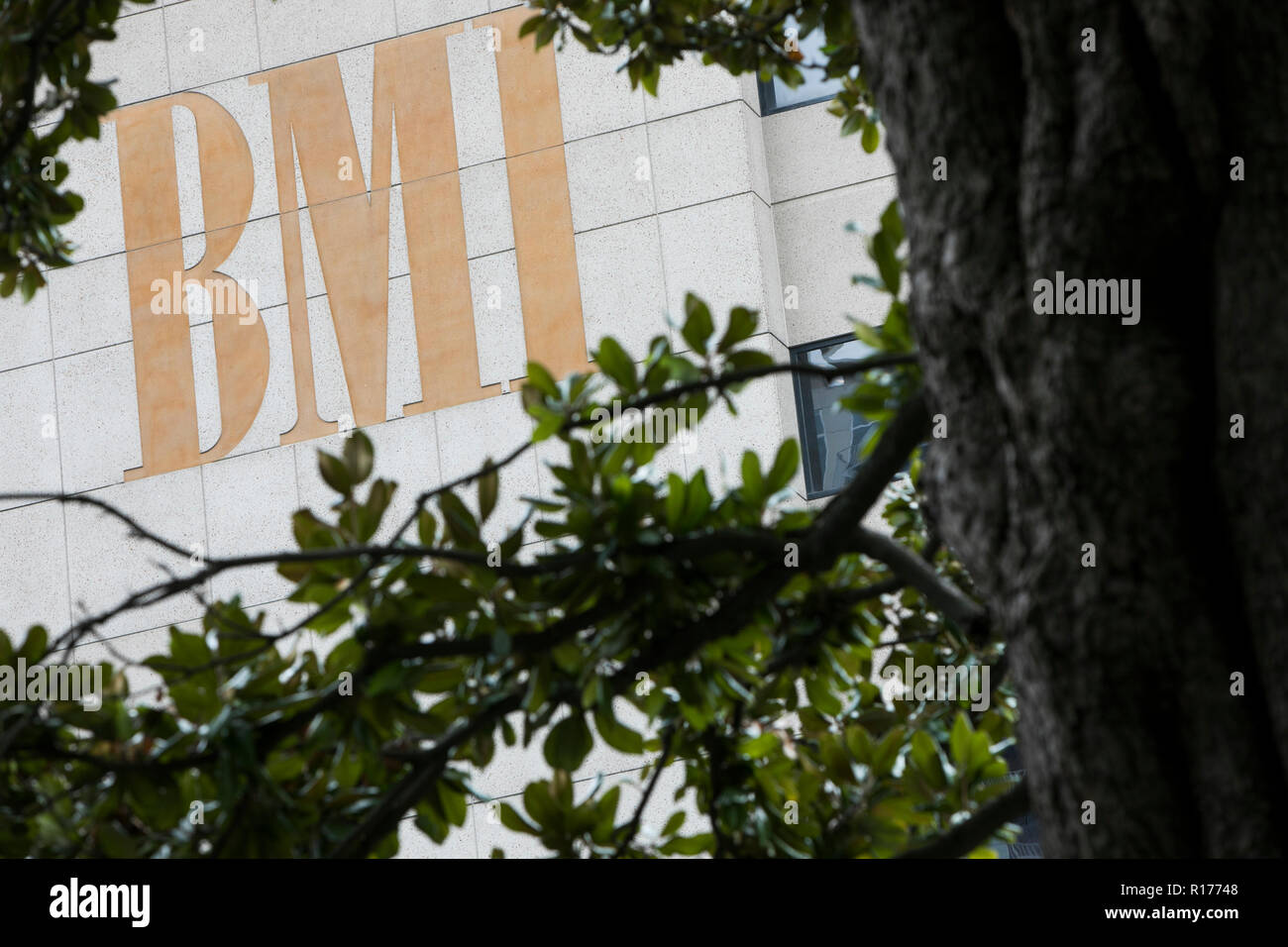 A logo sign outside of a facility occupied by Broadcast Music, Inc. (BMI) in Nashville, Tennessee, on October 9, 2018. Stock Photo