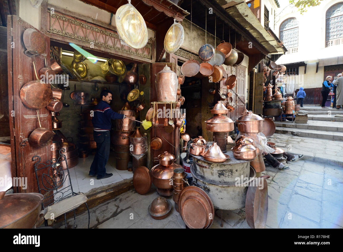 A blacksmith working in the old market of Fes. Stock Photo