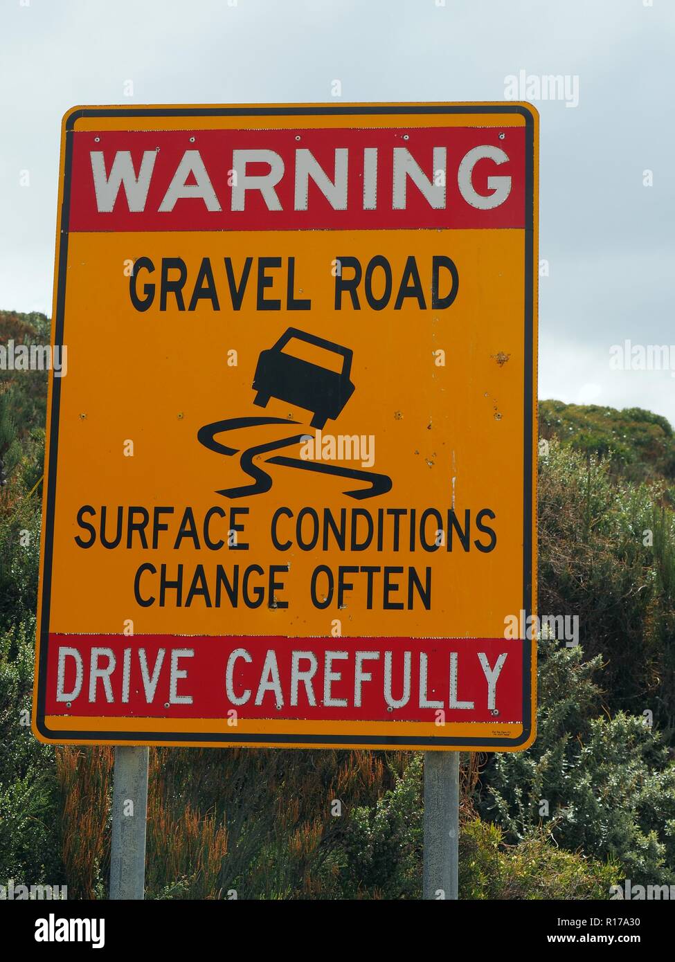 Gravel Road - Drive Carefully Stock Photo