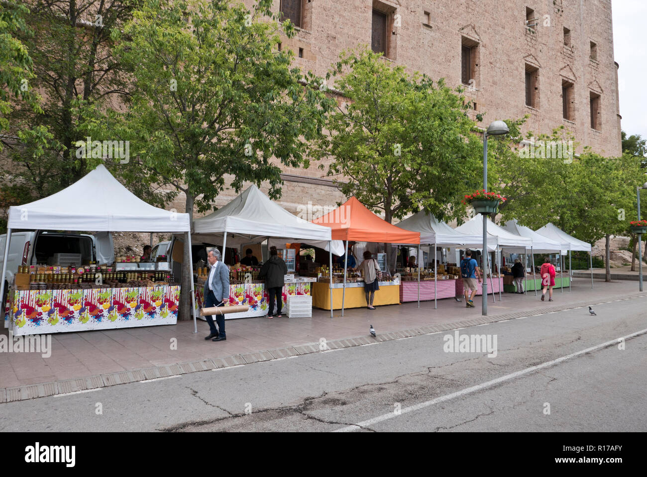 Stalls selling local produce outside the walls of the Montserrat Monastery, Monserrat, Barcelona, Spain Stock Photo