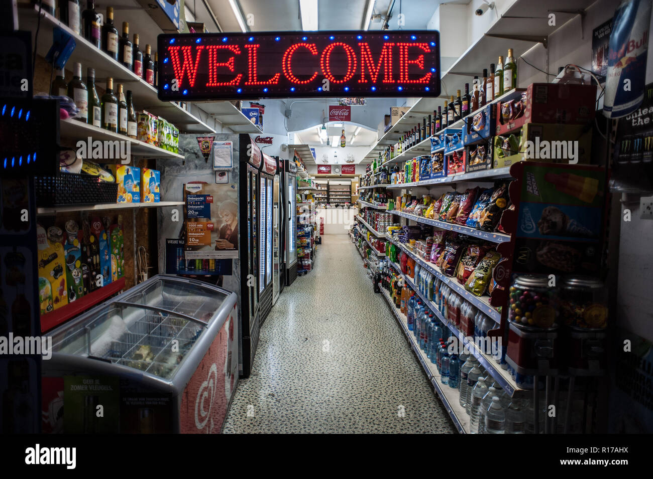 STORE - 'WELCOME' - FOOD STORE - SMALL SUPERMARKET STORE - SALT AND SWEETS - FOOD SHELVES -WAITING FOR CLIENTS - MAGASIN D'ALIMENTATION © F.BEAUMONT Stock Photo