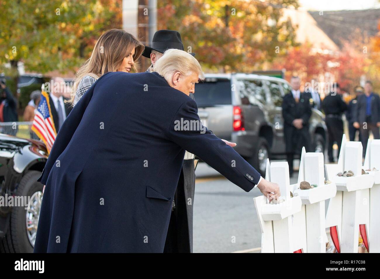 U.S President Donald Trump and first lady Melania Trump, place a stone from the White House on the memorial of those killed at the Tree of Life Synagogue October 30, 2018 in Pittsburgh, Pennsylvania. Stock Photo