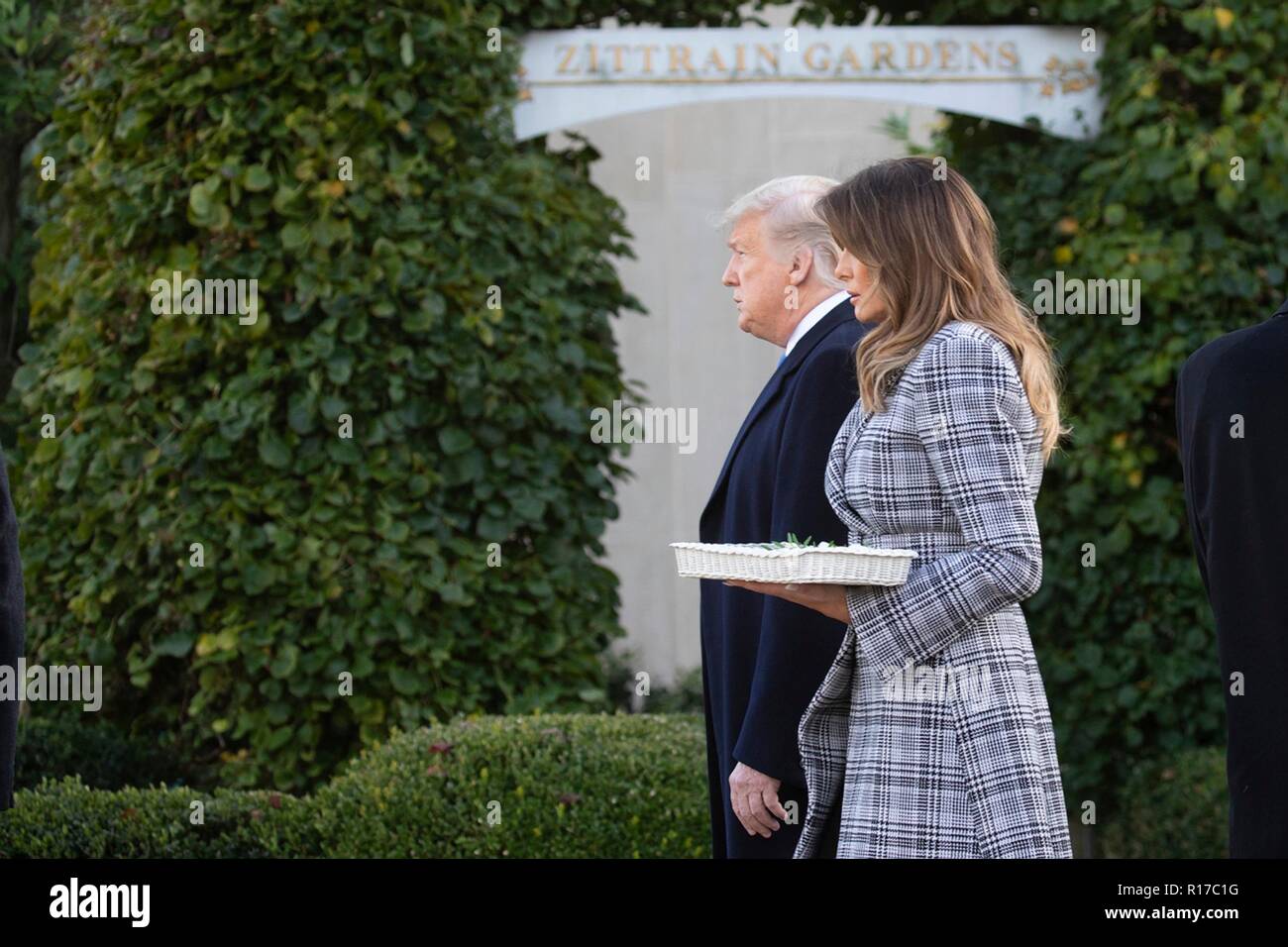 U.S President Donald Trump and first lady Melania Trump, walk together as they arrive at the memorial to the 11 worshippers killed at the Tree of Life Synagogue October 30, 2018 in Pittsburgh, Pennsylvania. Stock Photo