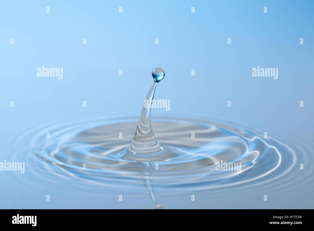 Water drop impact Stock Photo - Alamy