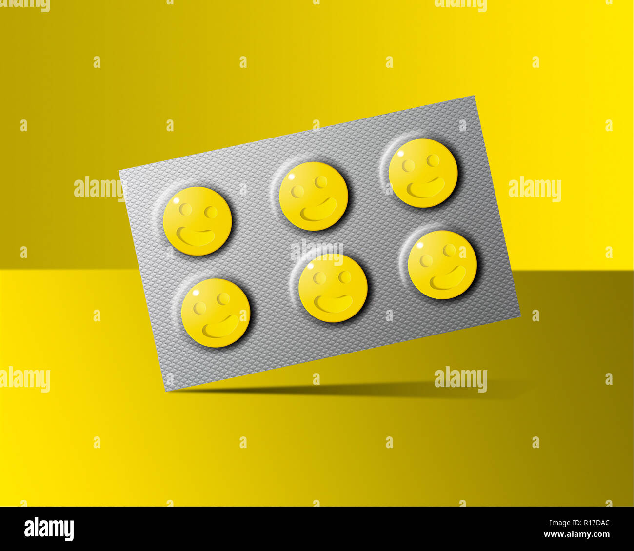 Tablet blister pack with yellow smiley face happy pills, still life Stock Photo